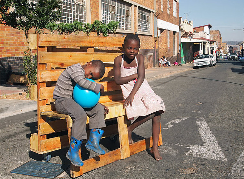 r1 recycles wooden pallets into interlocking mobile benches for johannesburg