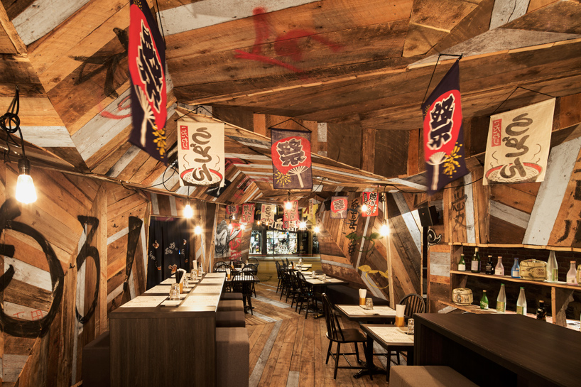 jean de lessard fits japanese restaurant with recycled timber