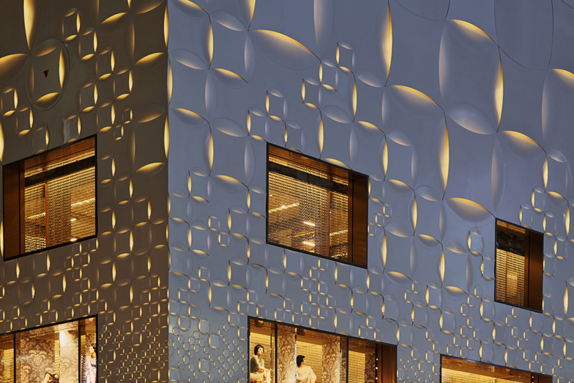 jun aoki&#39;s tokyo louis vuitton store features patterned façades