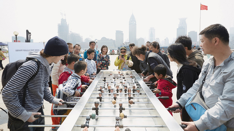 ogilvy mather shanghai shoot goals not guns international day of peace foosball table