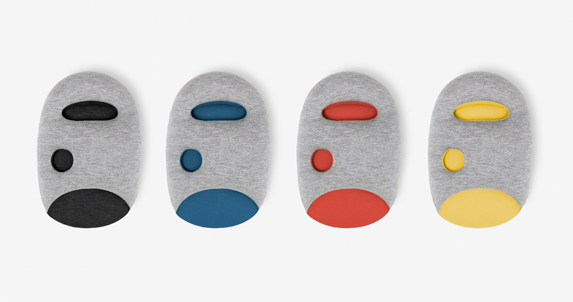 ostrich pillow mini attaches to hand, arm + elbow for easy napping