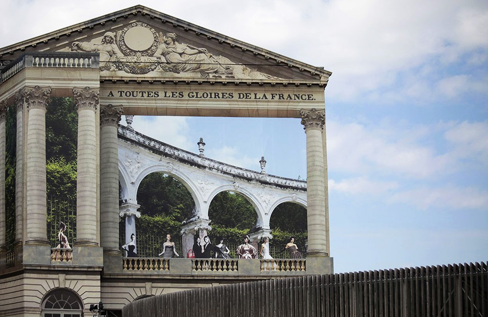 pierre delavie wraps palace of versailles in dior trompe l'oeil canvas