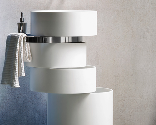 alessandro isola's orbit sink stacks swiveling rings of corian