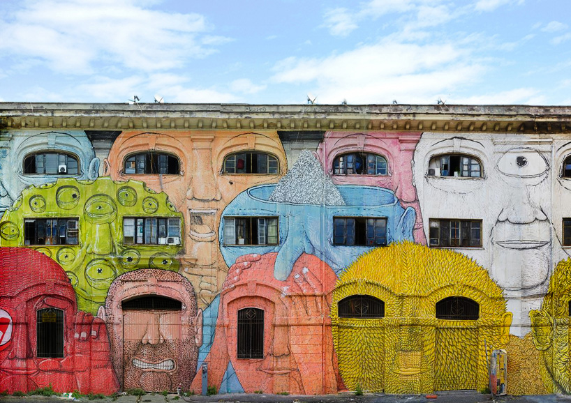 blu wraps roman military warehouse with mural of 50 faces