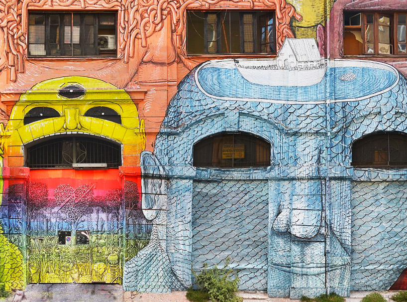 blu wraps roman military warehouse with mural of 50 faces