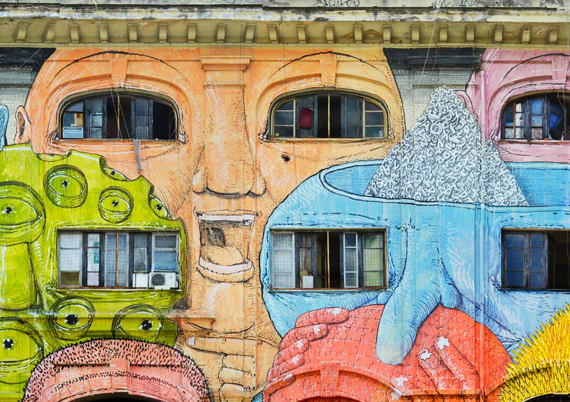 blu wraps roman military warehouse with mural of 50 faces