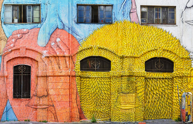 blu wraps roman military warehouse with mural of 50 faces