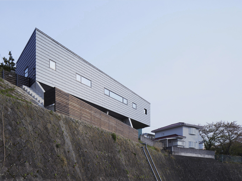 gata architects perches MS house atop steep incline