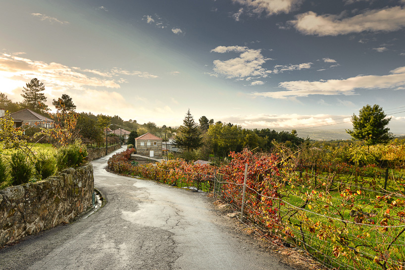 corpo atelier wood structure inside stone walls portugal designboom