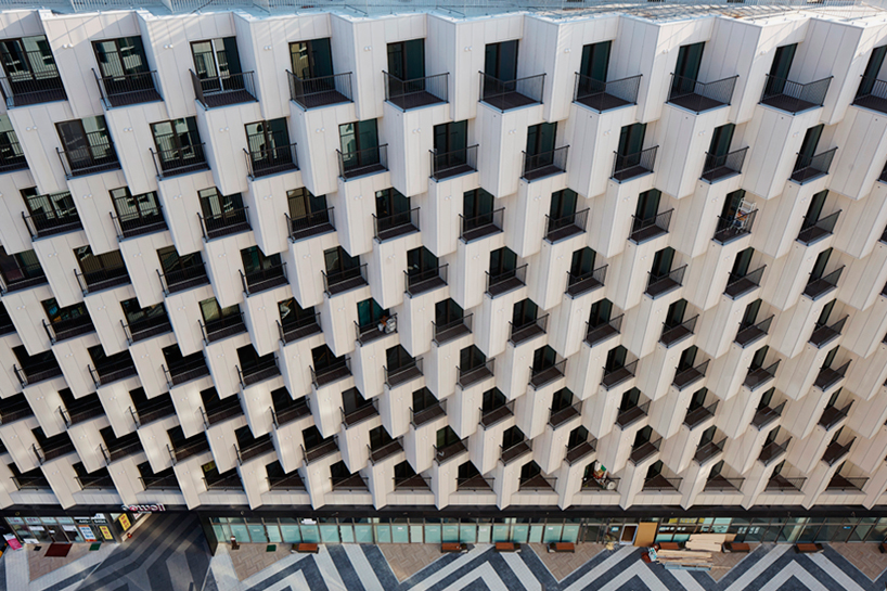 JDS architects unites office + hotel with staggered structure in seoul