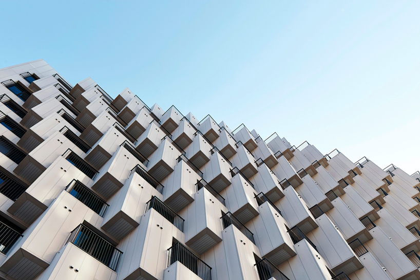 JDS architects unites office + hotel with staggered structure in seoul