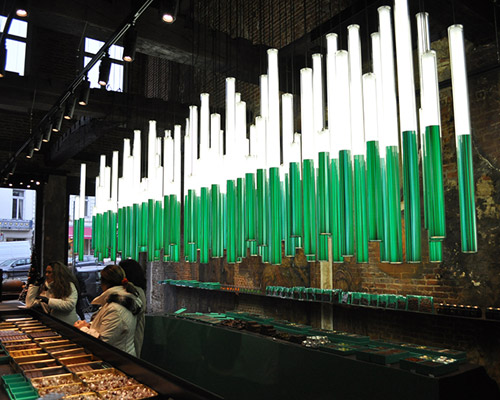 gilbert moity sculpts hanging forest for belgian chocolate shop