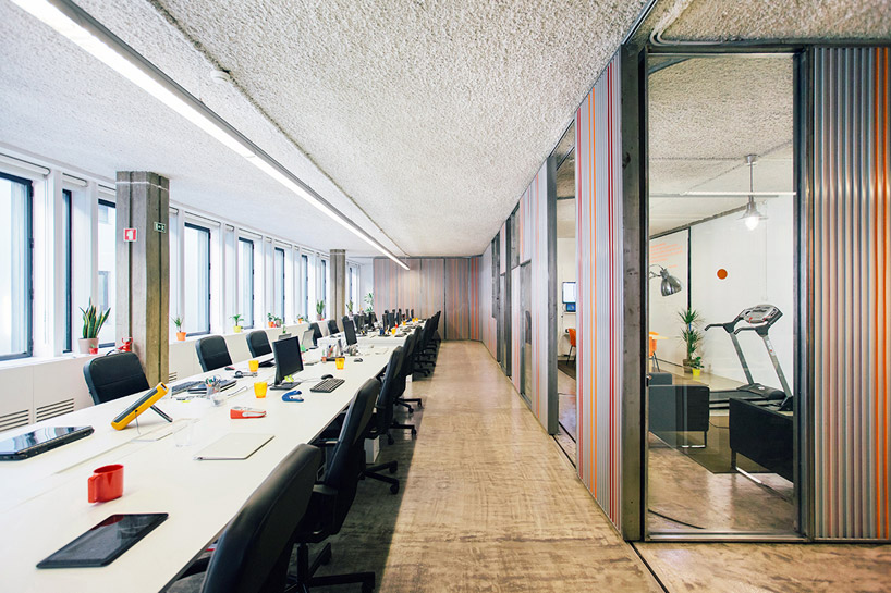 LIKEarchitects adapts kinematix office with moving garage doors