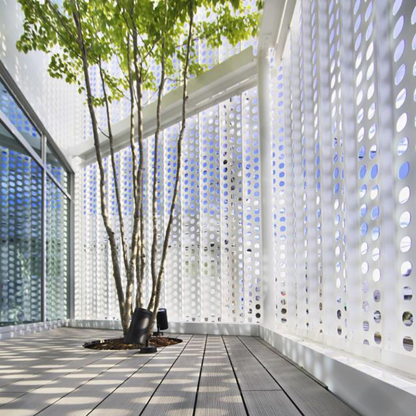 office block in japan by hiroyuki moriyama encloses a planted garden