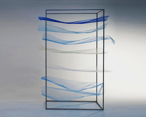 mizuki odashiro fastens pieces of colored tulle in the tone shelf 