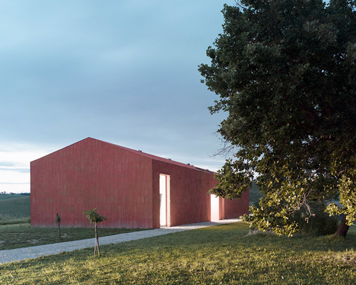 studio zero85 + sergio sarra constructs home studio for an artist from hollow tiles