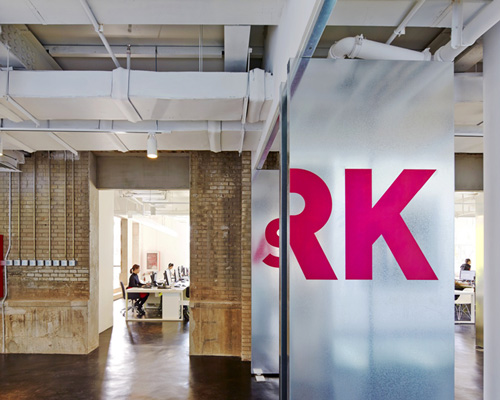 SPARK's beijing office is partitioned using metal-clad swivel doors
