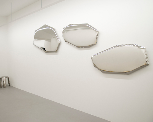 oskar zieta tafla mirrors' unusual form reflects your unique world