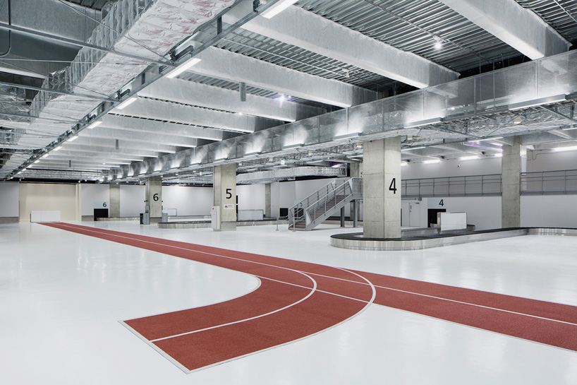 narita airport terminal 3 running track party muji nikken designboom