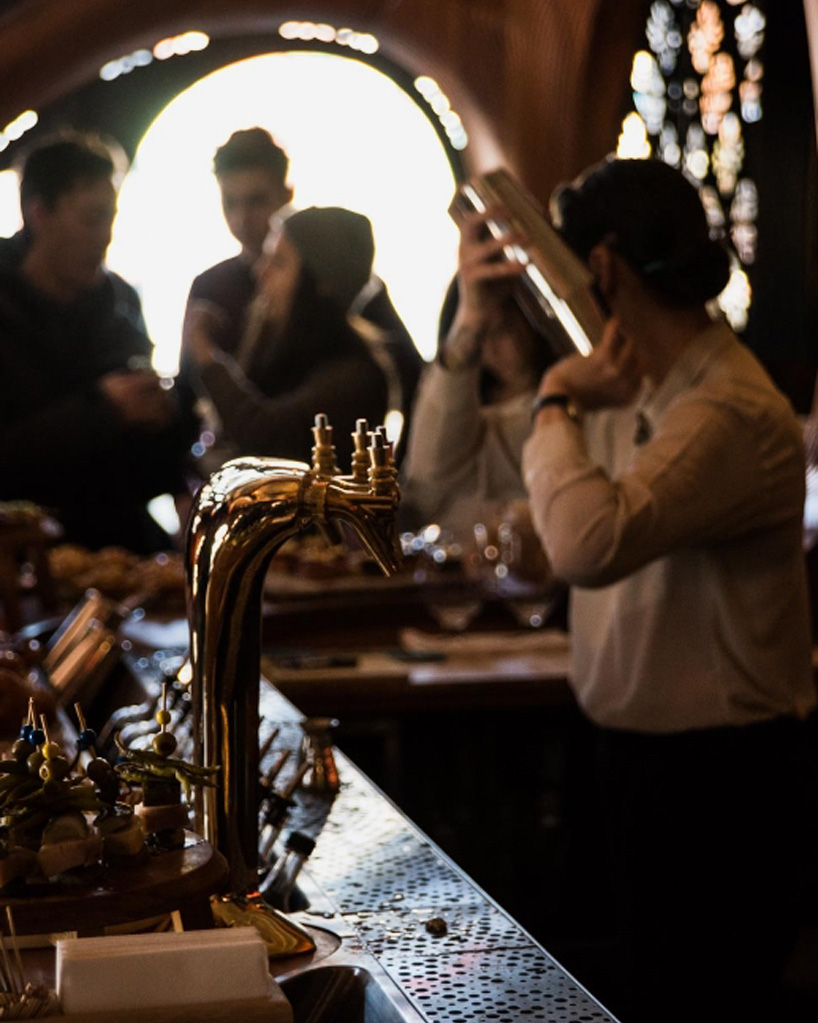 bar raval by partisans features carved mahogany interiors