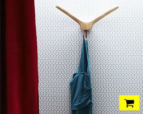 app wall hook takes its curves from the arching wings of a seagull
