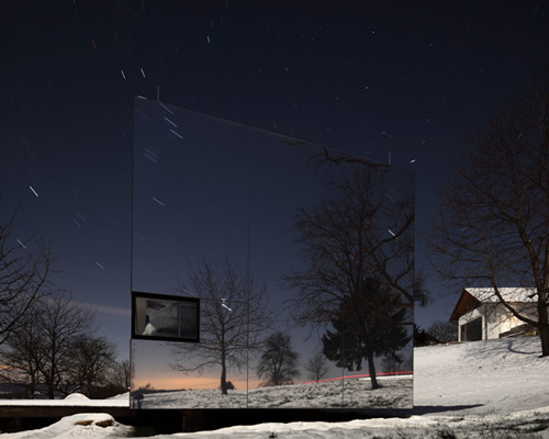 delugan meissl's prefabricated home serves as an invisible retreat