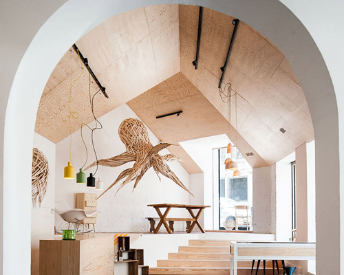atelier m3a architects creates light, airy storefront for labo