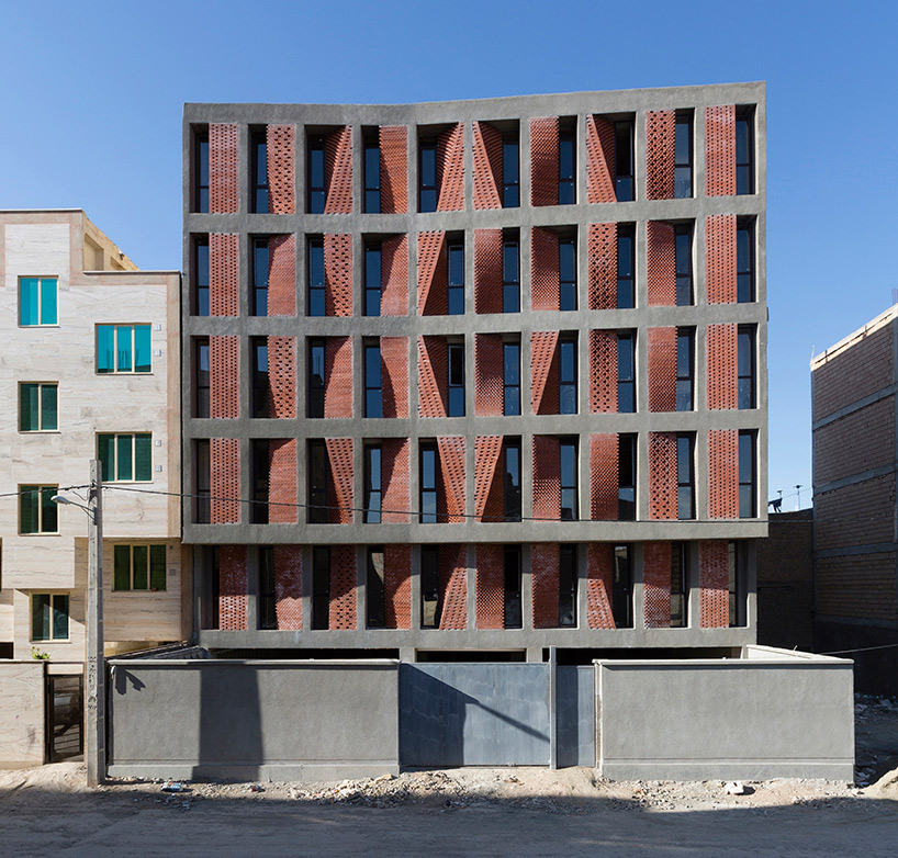 caat studio uses bricks to diversify low-cost apartment complex in iran