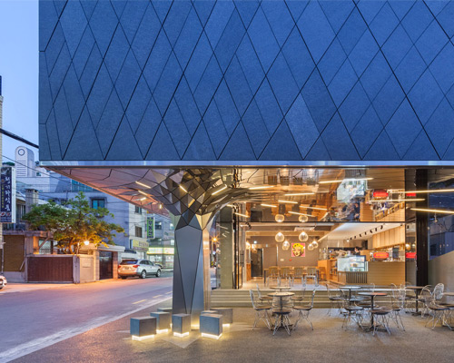 daewha kang uses mirrored stainless steel to transform communique HQ