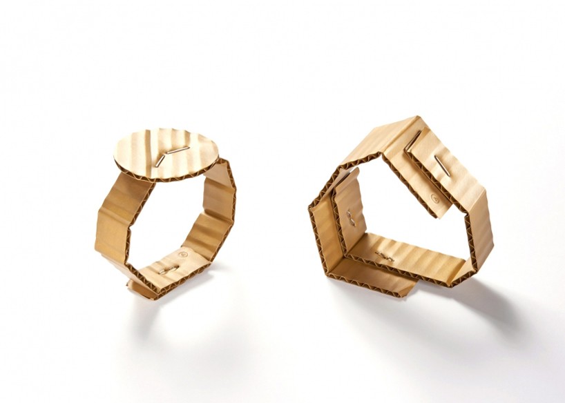 david bielander delicately crafts cardboard looking bracelets made of gold