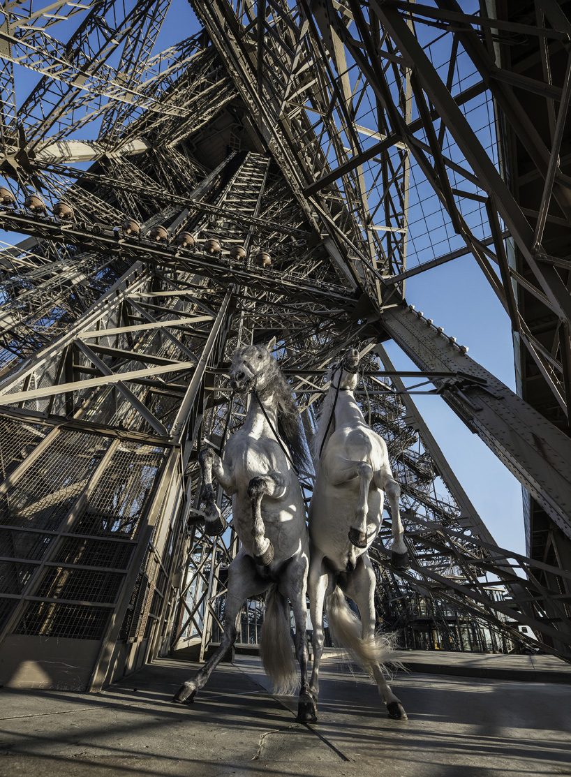 yee-haw: paola pivi brings four horses to the eiffel tower