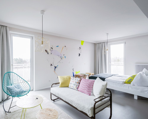 refugees and guests reside side-by-side in magdas hotel