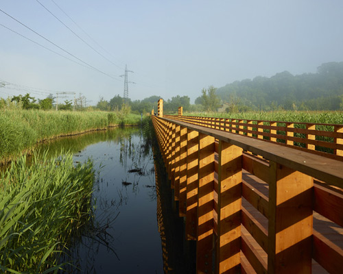 microscape constructs lotus flower pedestrian/cycling path