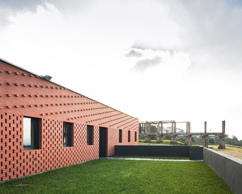 saavedrarquitectura builds brick clad school house in guimarães