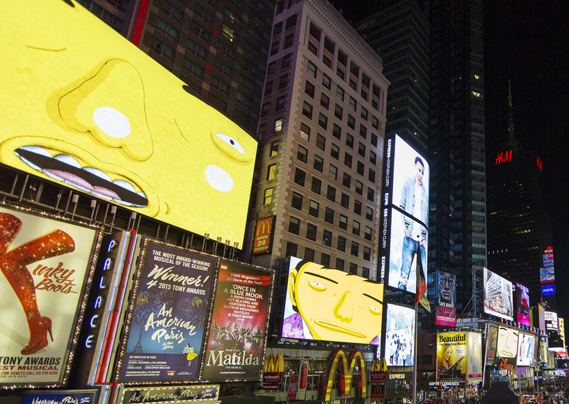 os-gemeos-times-square-midnight-moment-parallel-connection-designboom-04