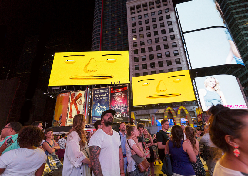 os-gemeos-times-square-midnight-moment-parallel-connection-designboom-52