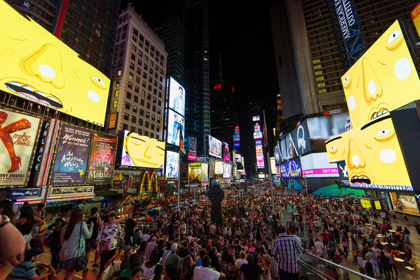 OS GEMEOS times square-midnight-moment-parallel-connection-designboom-55