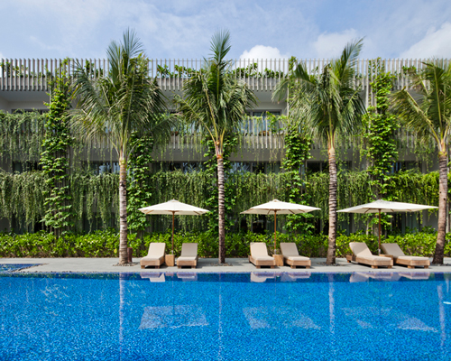 vo trong nghia blends greenery with concrete louvers in vietnamese naman retreat