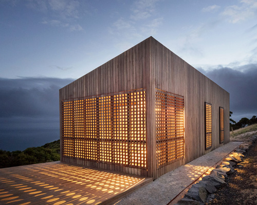 moonlight cabin by jackson clements burrows overlooks australia's coastal landscape