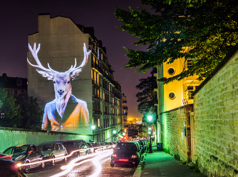 julien nonnon projects a safari of smartly-dressed wildlife on the streets of paris