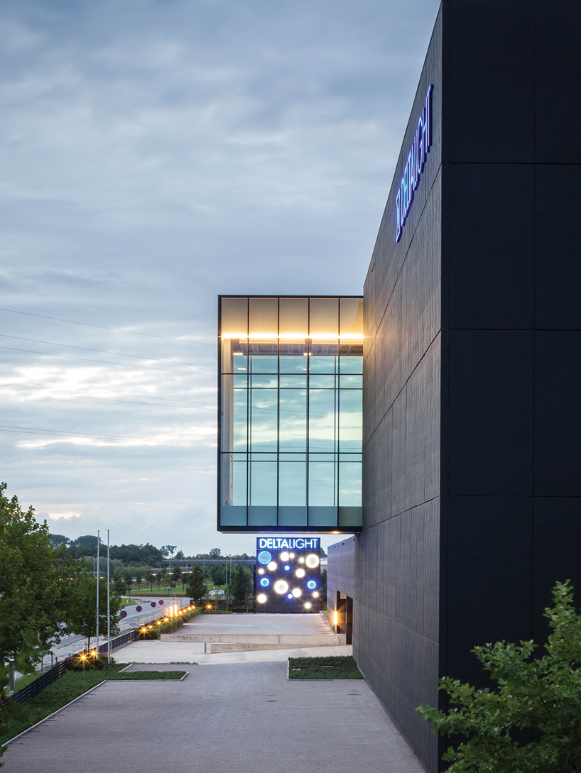 delta light expands headquarters in belgium with 26meter high