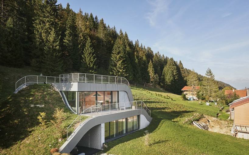 JDS architects embeds secluded casa jura into the rolling french landscape