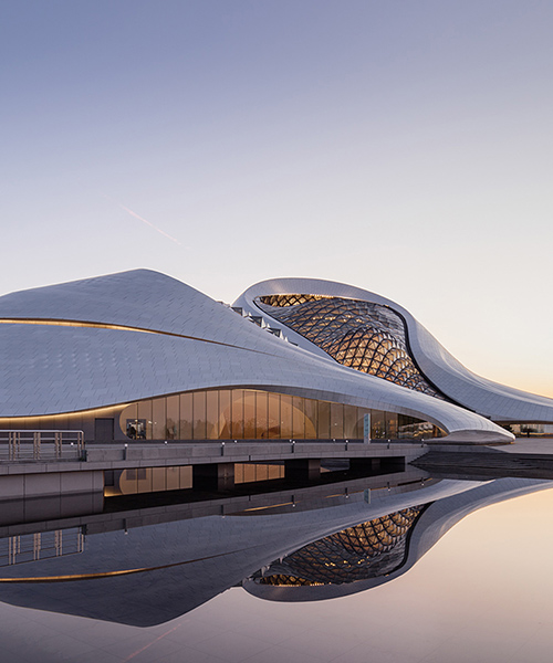 MAD architects' fluidformed harbin opera house opens in china