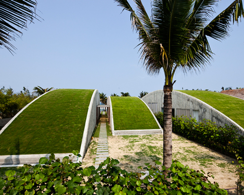 undulating green villas finalize vo trong nghia's naman retreat in coastal vietnam