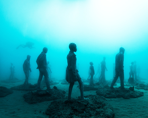 jason decaires taylor submerges underwater museum off the coast of lanzarote, spain