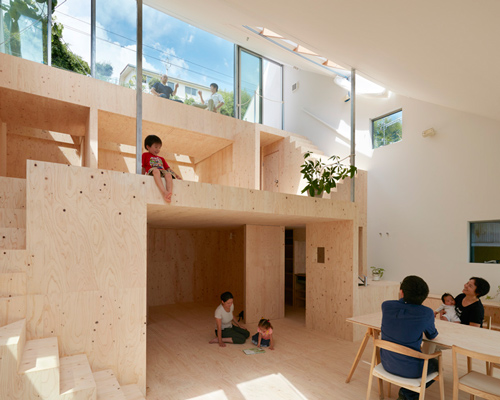tomohiro hata's hillside house interior integrates terraced platforms