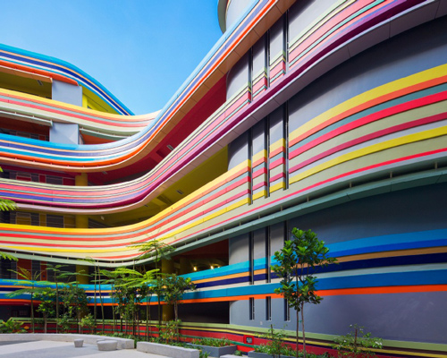 studio505 expands school in singapore with colorful rainbow-like extension