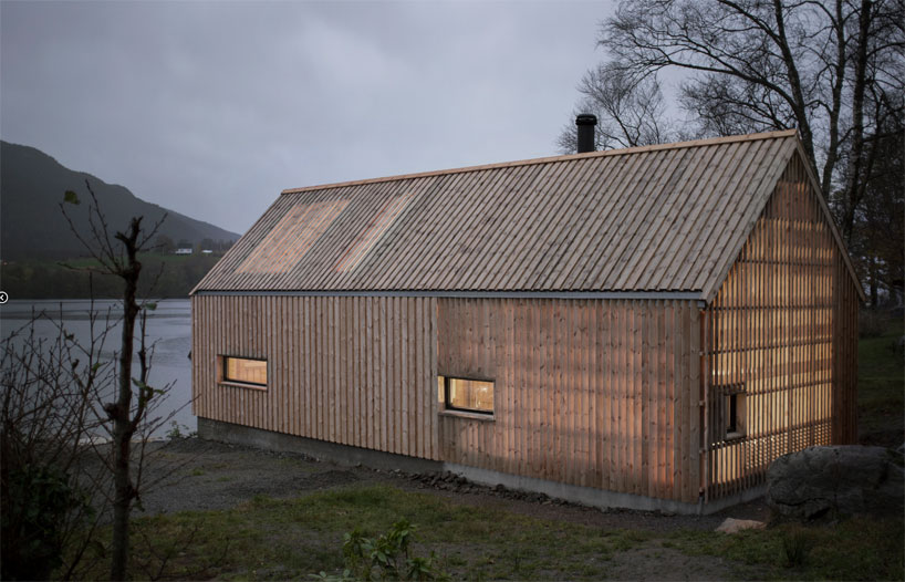 kolab and koreo architects revitalizes timber boathouse in 