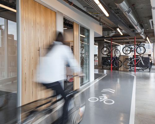 perkins + will winds a bicycle test track through SRAM's chicago HQ