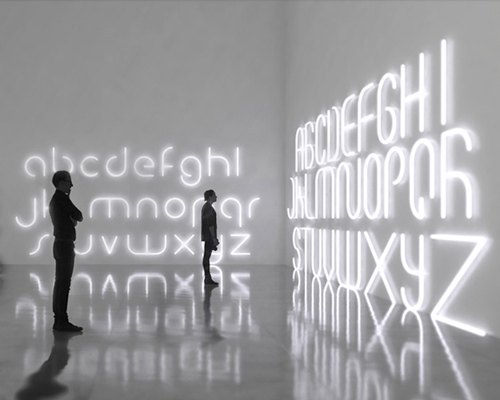 BIG and artemide light up milan design week with alphabet lamps